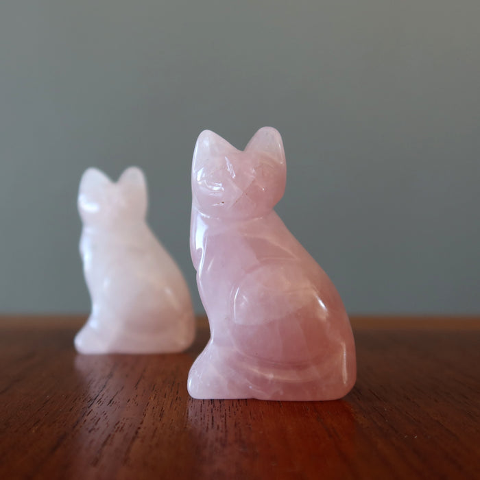 two rose quartz cats