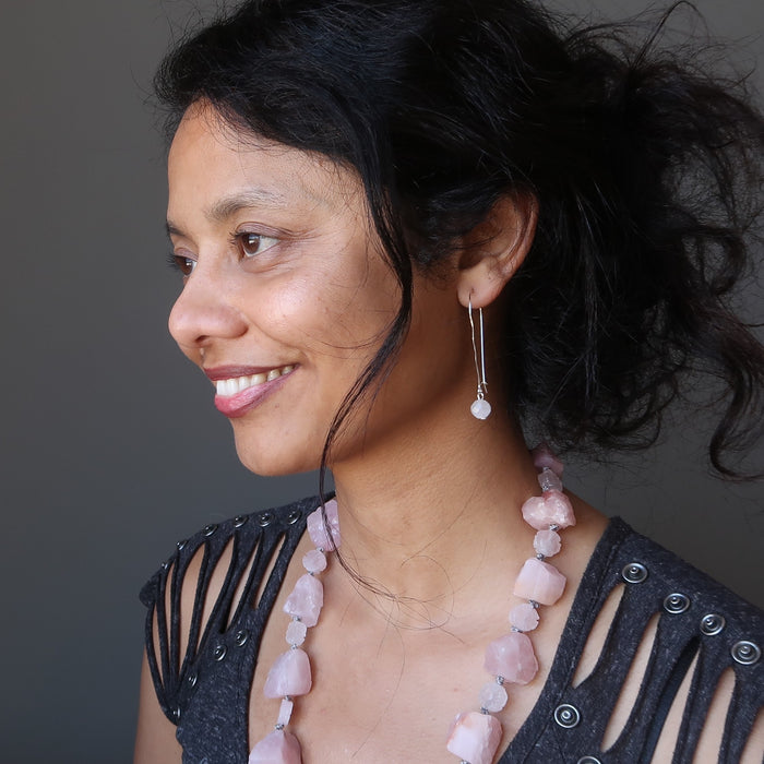 sheila of satin crystals wearing faceted rose quartz on hammered sterling silver earrings