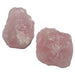two raw chunks of pink rose quartz