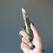 hand holding ruby zoisite tapered massage wand