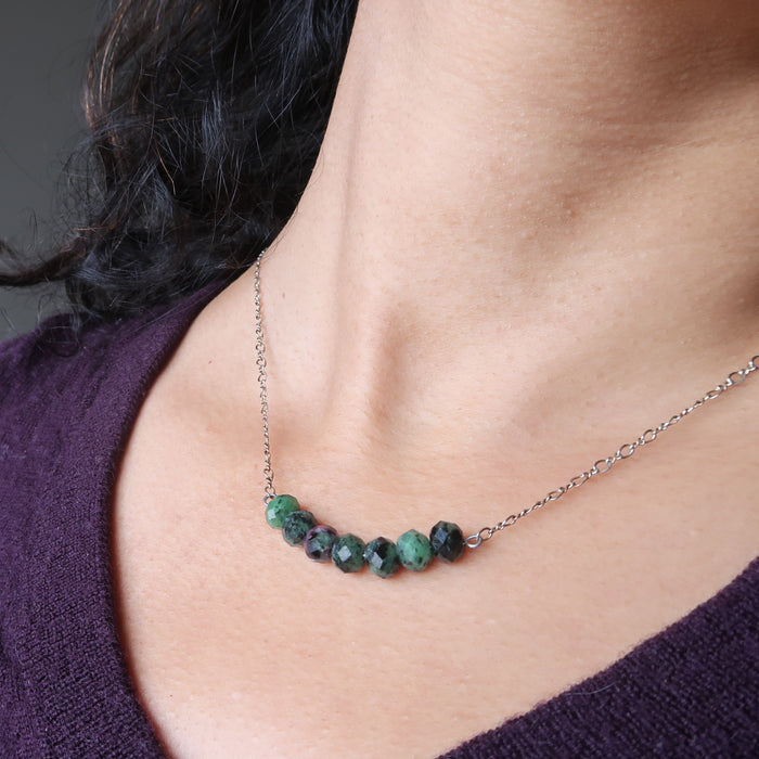 female wearing ruby zoisite necklace 