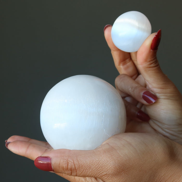 two white selenite spheres
