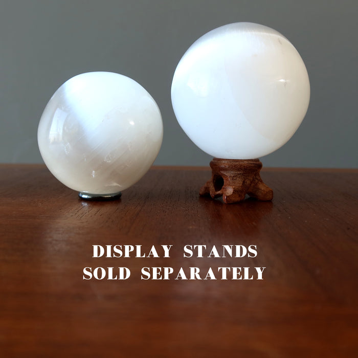 white selenite spheres on stands