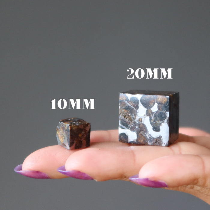 two sericho meteorite cubes showing difference in size