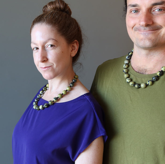 male and female wearing serpentine necklace