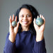 sheila holding 2 Serpentine Spheres one on each hand