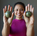 sheila holding Serpentine Spheres on both hands