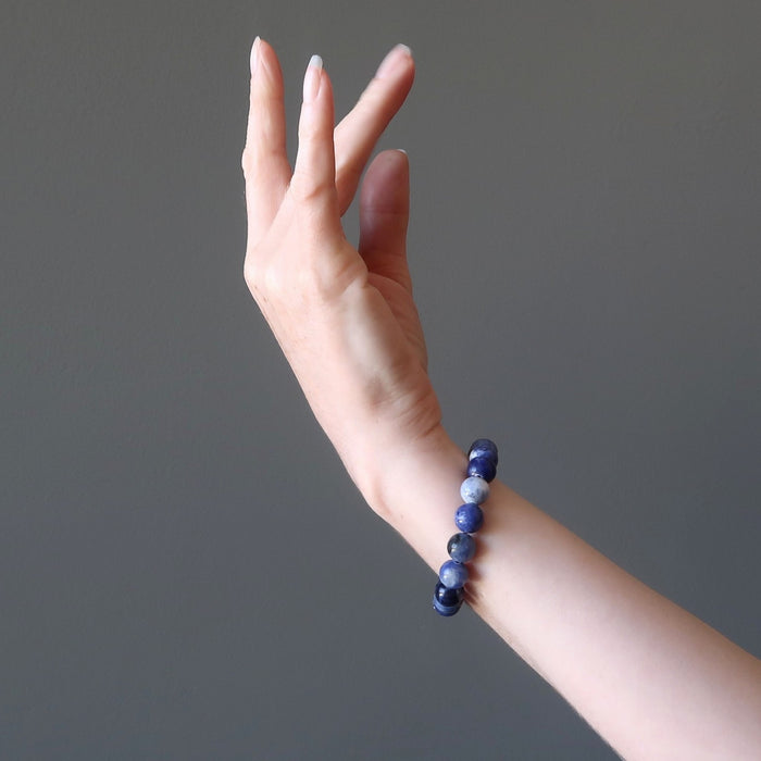 blue sodalite bracelet modeled on an arm