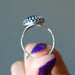 finger tips displaying Sterling Silver Adjustable Sodalite Ring 