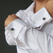  blue sodalite gold cufflinks on model wearing white french cuff shirt