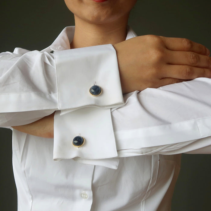 sheila of satin crystals wearing  blue sodalite gold cufflinks on white french cuff shirt