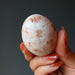 hand holding Sunstone Egg