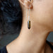sheila of satin crystals wearing tigers eye point fine silver earrings