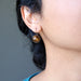 sheila of satin crystals wearing golden tigers eye leverback earrings