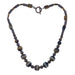 golden brown Tigers Eye  polished into round, twist, and rectangle beads and strung with antiqued accent beads secured with an ornate toggle clasp