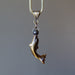 tigers eye dolphin and black ball pendant on thick metal necklace