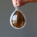 golden brown tigers eye teardrop in silver pendant in satin crystals gift box