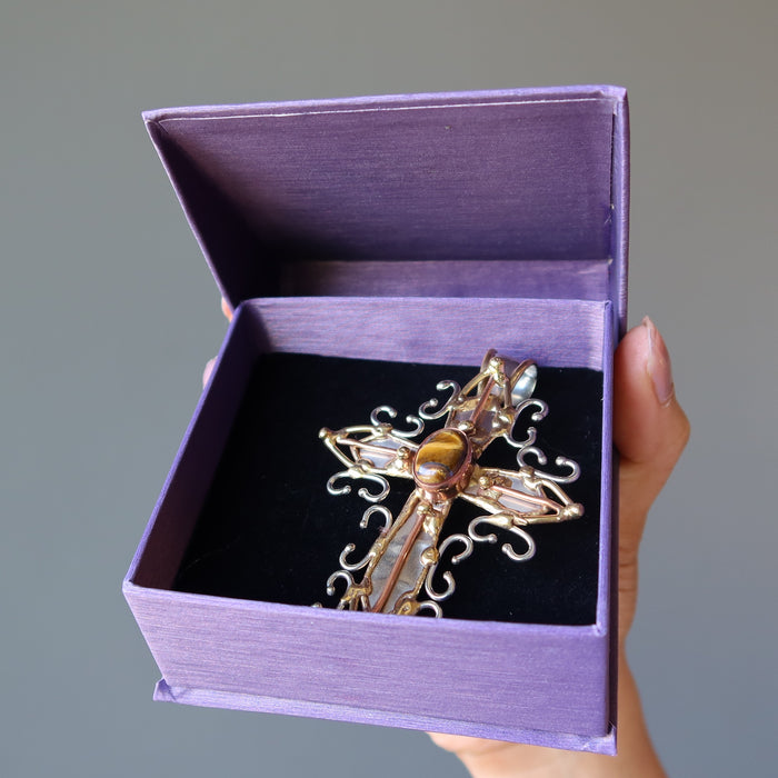 golden tigers eye oval in fancy metal cross pendant in purple gift box