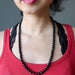 sheila of satin crystals wearing faceted Black Tourmaline beads necklace