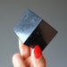 black tourmaline cube in hand
