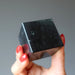 black tourmaline cube in hand