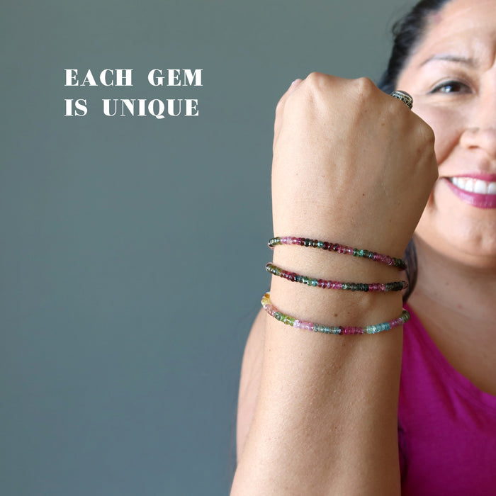layered three faceted rainbow tourmaline bracelets on womans wrist