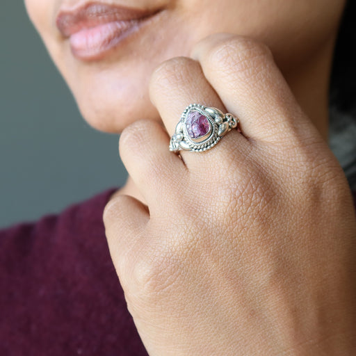 pink tourmaline ring on finger