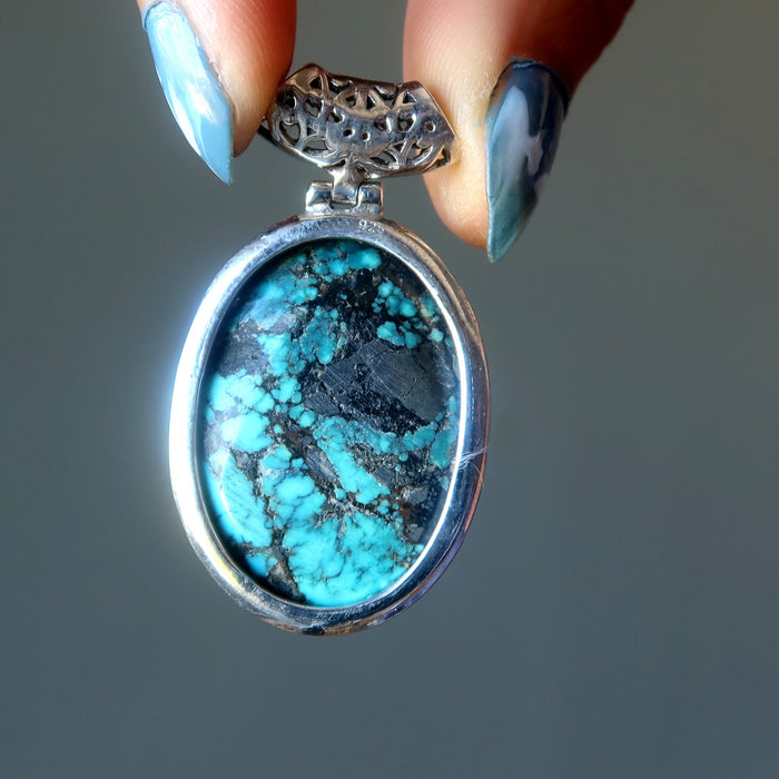 back of turquoise oval pendant