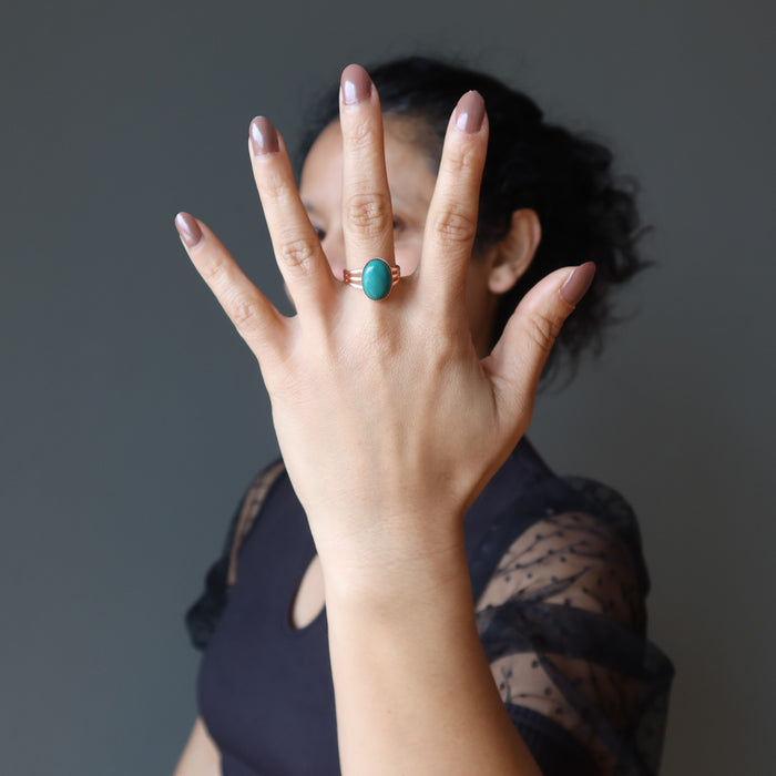 sheila of satin crystals wearing a turquoise copper ring