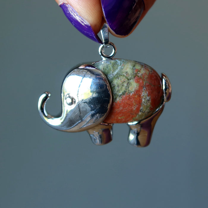 holding  Unakite elephant pendant