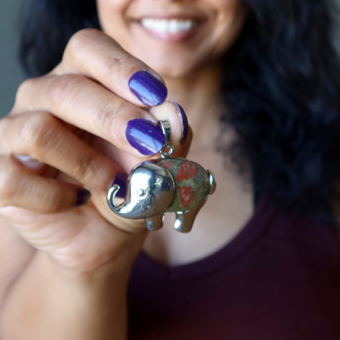 holding Unakite elephant pendant