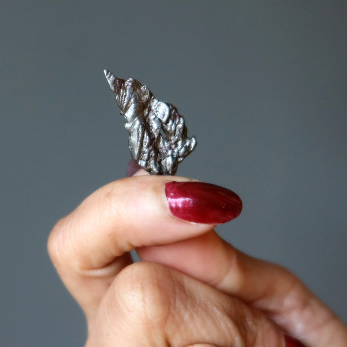hand holding uruaca meteorite
