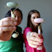 jessica and holly of satin crystals holding jade and rose quartz facial roller wands